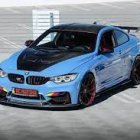 Blue and Black Modified BMW Sports Car on Racetrack