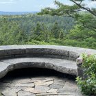 Curved Stone Bench Overlooking Tranquil Sea and Islands