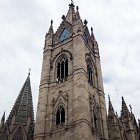 Fantastical Cathedral with Iridescent Walls and Colorful Orbs