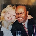 Portrait of Two Women with Curly Blonde Hair in Dark Jackets