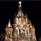 Multicolored Lights Illuminate Church Architecture at Night