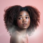 Colorful Cosmic Afro Woman Portrait on Pink Background