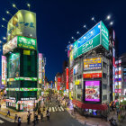 Colorful luminous futuristic cityscape at night with sleek vehicle and glowing flora