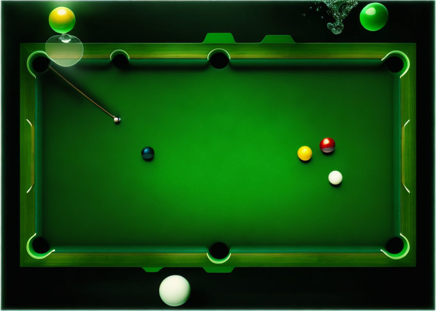 Billiard table with scattered balls, cue stick aiming in dimly lit room