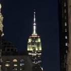 Empire State Building Night View with Starry Sky and Skyscrapers