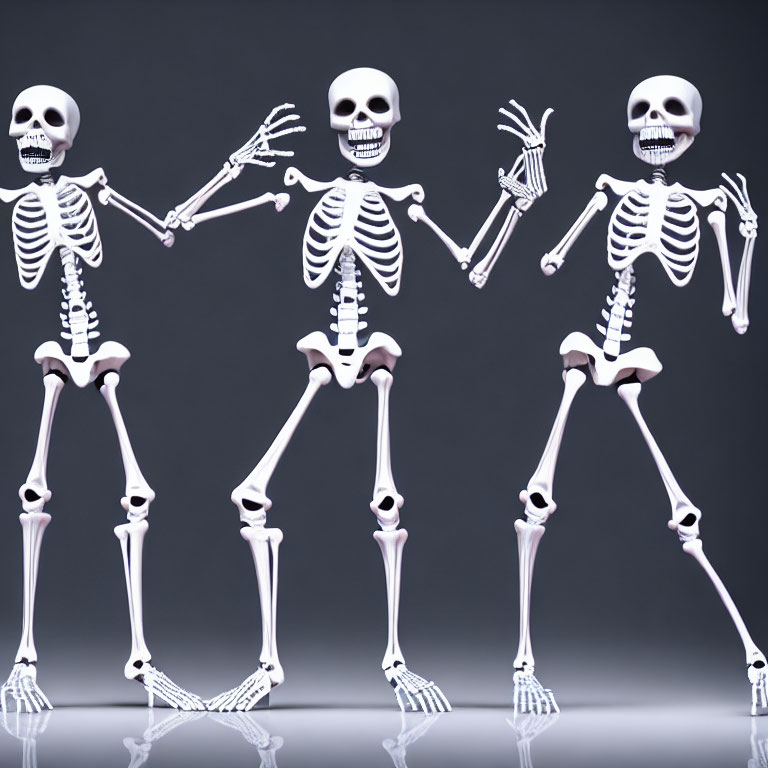 Three cartoon skeletons in playful poses against plain background