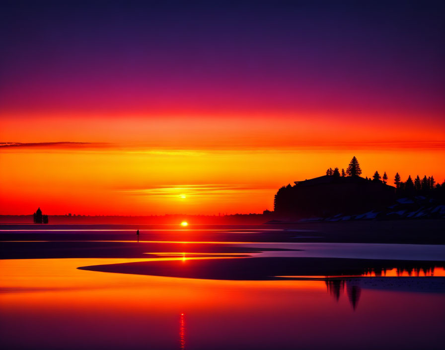 Scenic sunset with orange and purple hues over tranquil sea