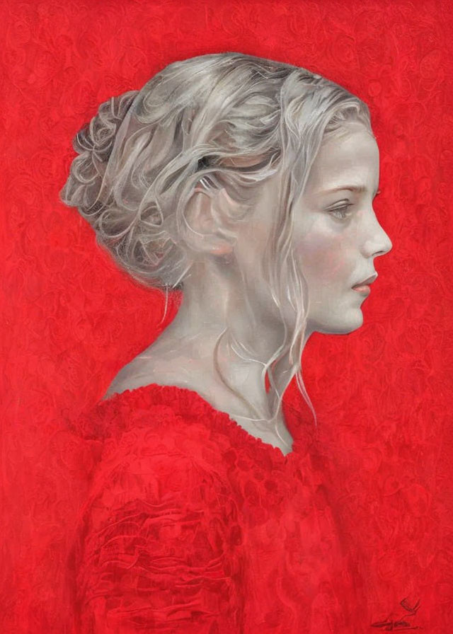 Profile Portrait of Young Woman with Blonde Updo on Red Background