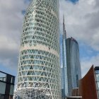 Futuristic skyscraper with tubular structure and diagrid pattern in digital watercolor