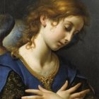 Cherubic figure in blue robes with wings