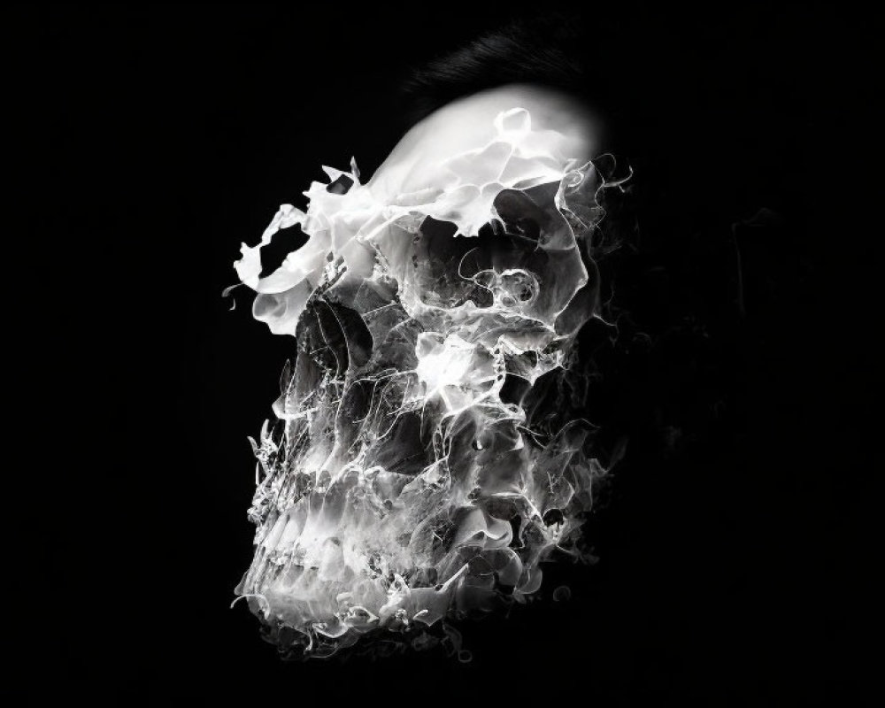 Human skull profile with white smoke on black background