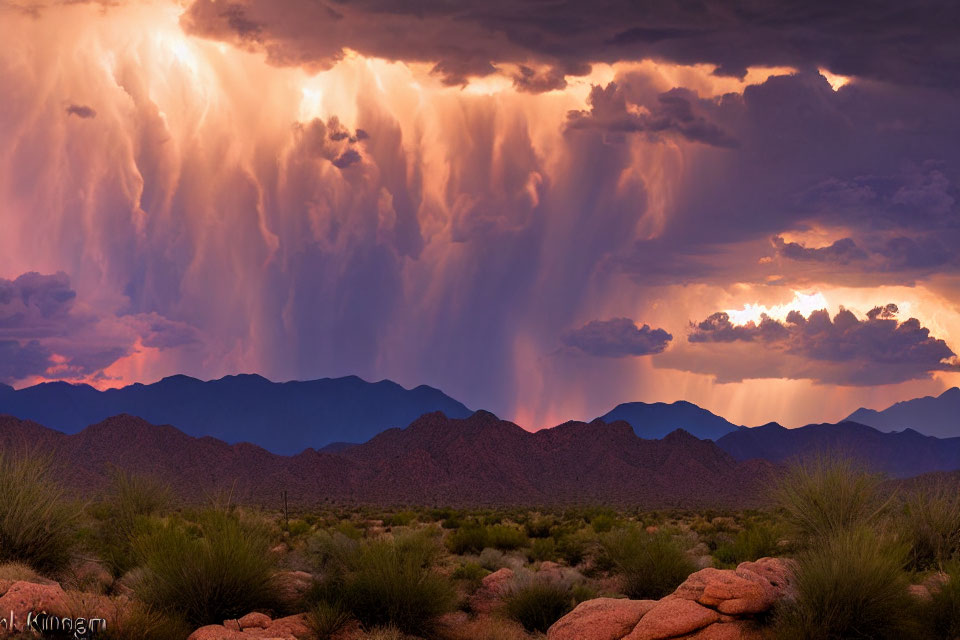 Vibrant thunderstorm with lightning over mountainous desert at twilight