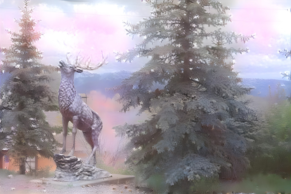 Mountain Landscape with Elk statue in foreground