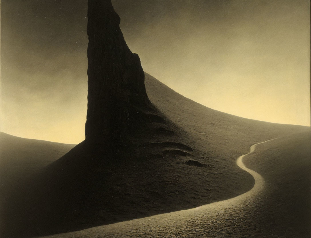 Sepia-Toned Photograph of Desolate Landscape with Tall Rock Formation