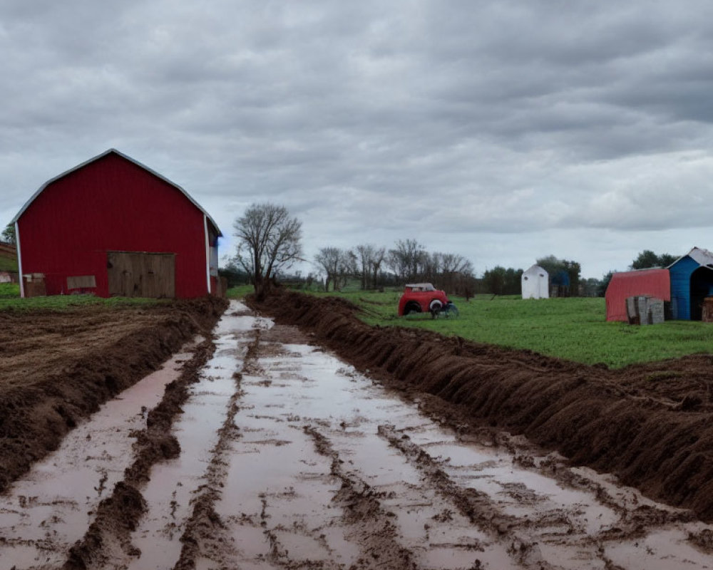 Rural farm scene with muddy road, red barn, truck, and cloudy sky