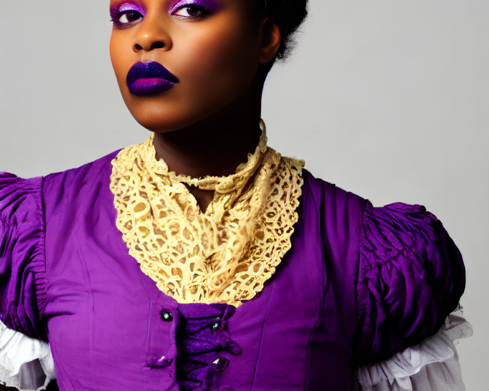 Striking purple makeup and vintage dress on woman pose against neutral background