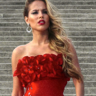 Woman in Red Ruffled Dress Submerged in Water