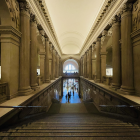 Neoclassical building with towering columns and ornate domes