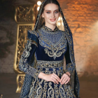 Elaborate Medieval-Style Blue Gown Against Dusky Sky