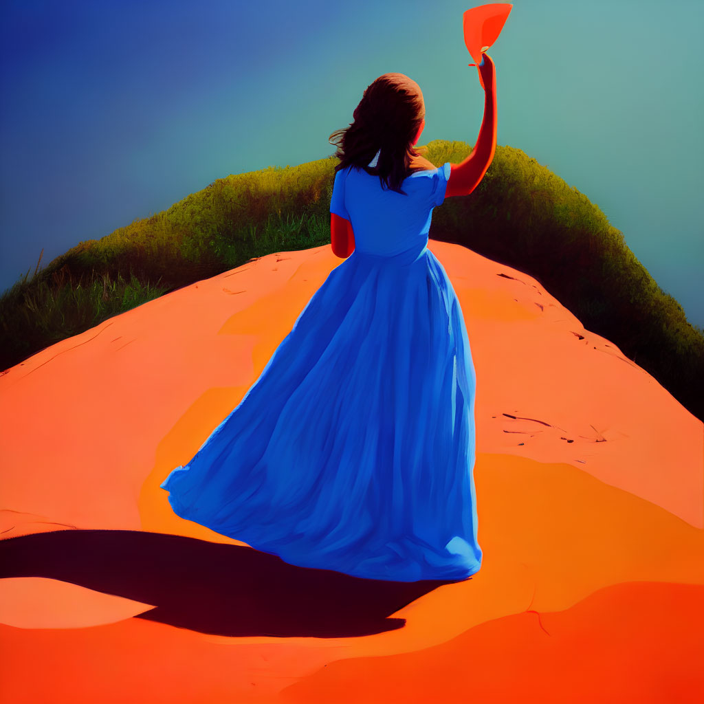 Woman in Flowing Blue Dress with Orange Scarf on Sandy Hill