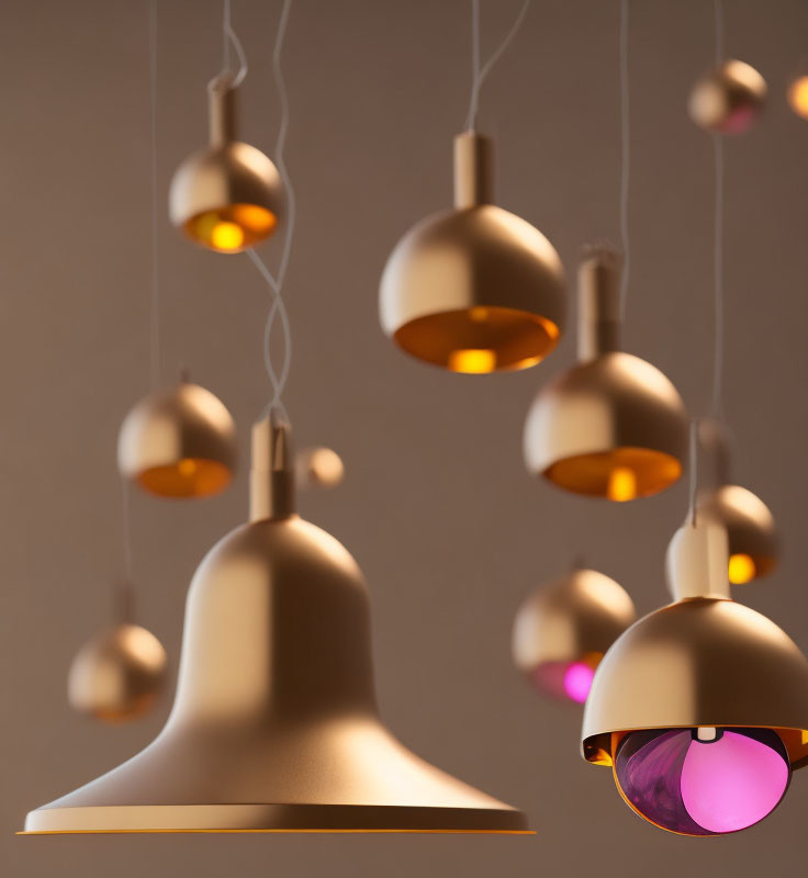 Matte Gold Pendant Lights Against Neutral Background