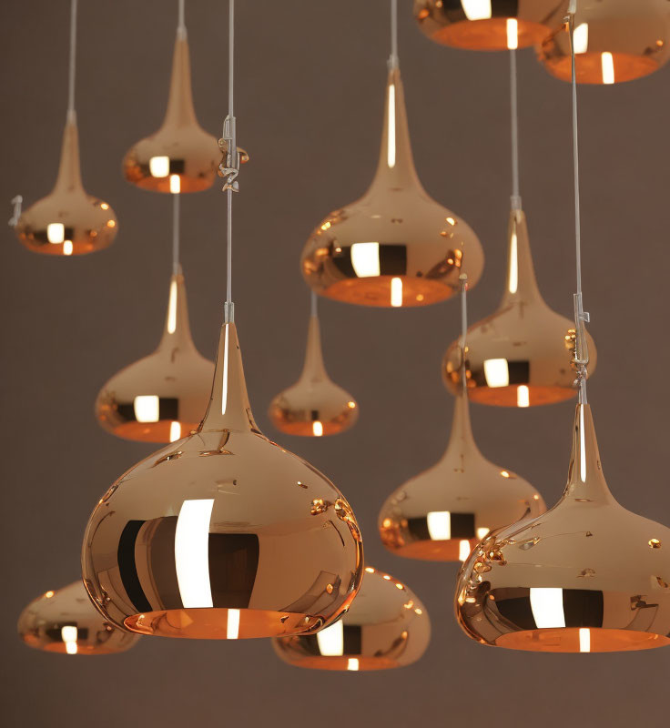 Reflective Modern Copper Pendant Lights Emitting Warm Golden Light