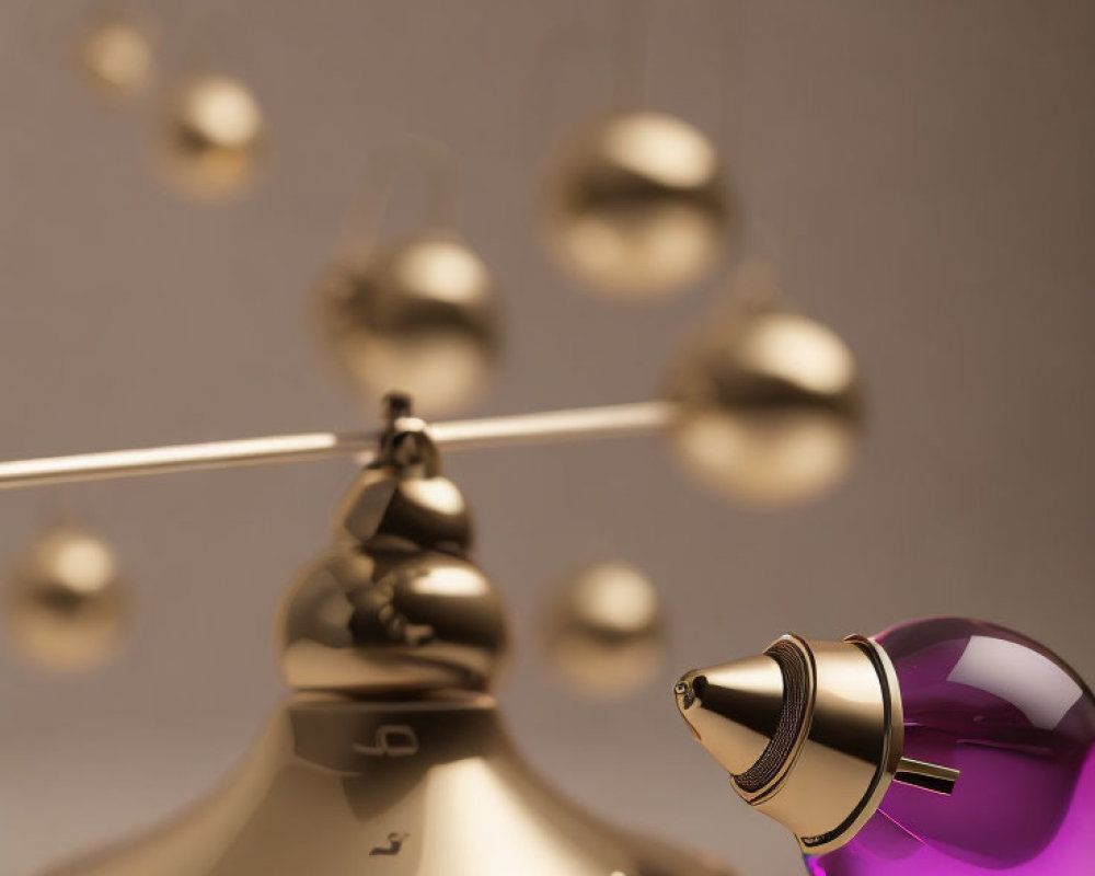 Purple Glass Perfume Bottle with Gold Atomizer on Golden Bell and Floating Bells on Beige Background