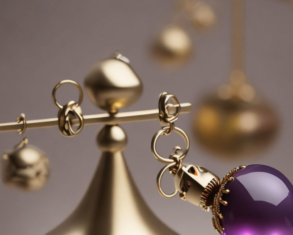 Gold-Tone Balance Scale with Assorted Ornaments and Purple Bauble