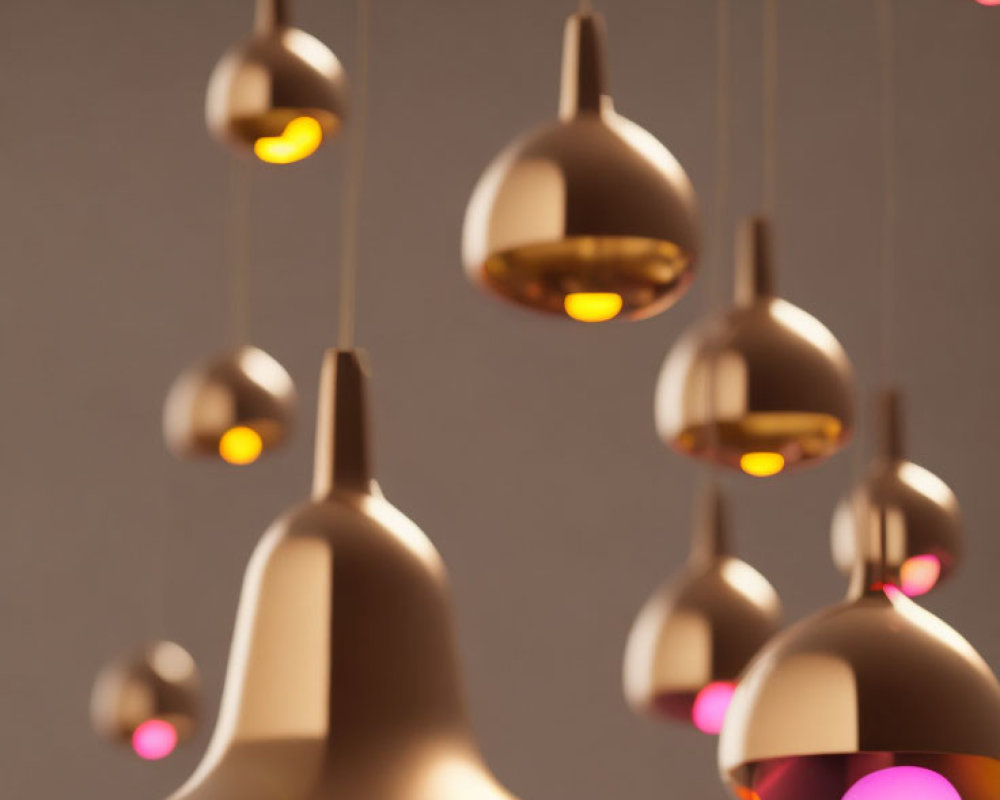 Metallic Finish Pendant Lights Against Soft Grey Background - Warm Glowing Interiors