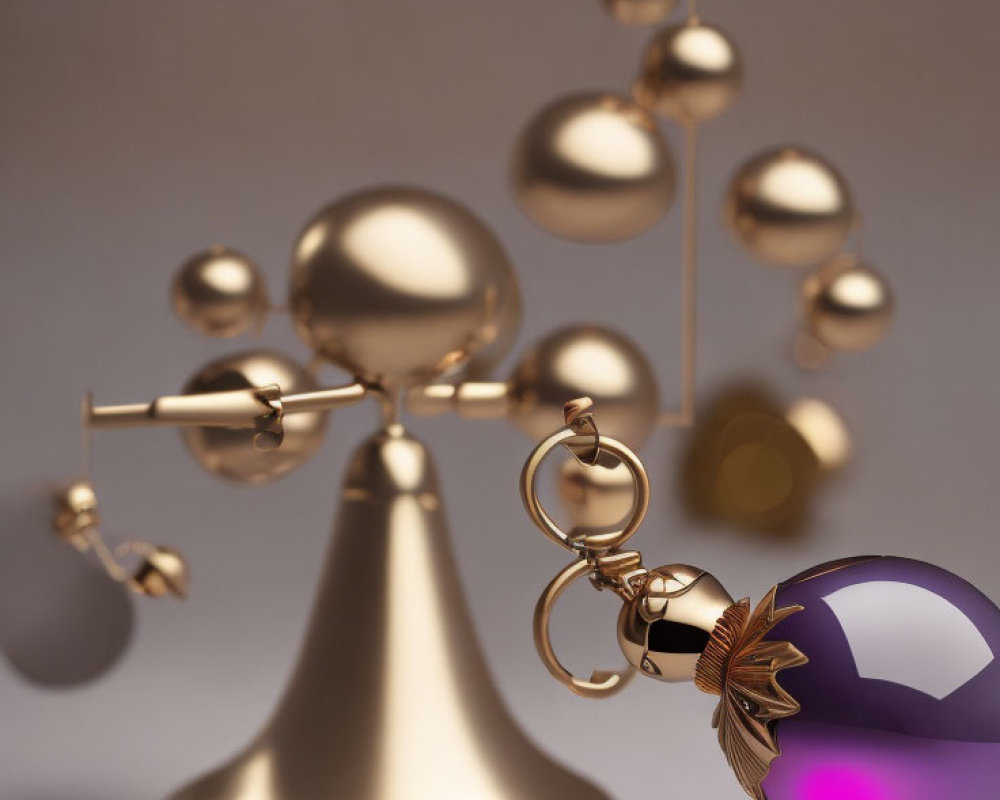 Brass kinetic balance sculpture with suspended spheres and purple glass ornament