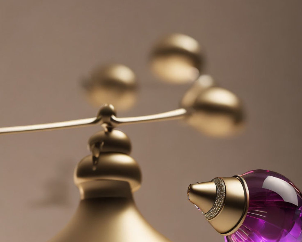 Golden balance scale with brass bell and purple glass perfume bottle