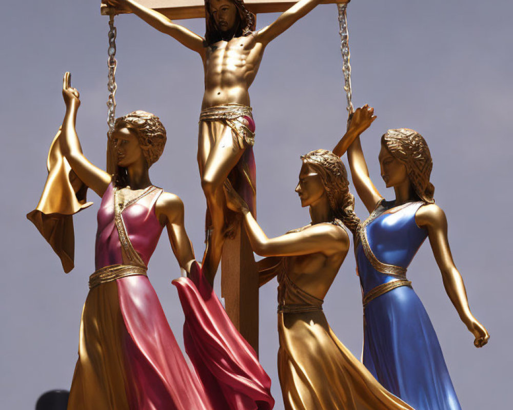 Three robed figures around crucified individual sculpture.