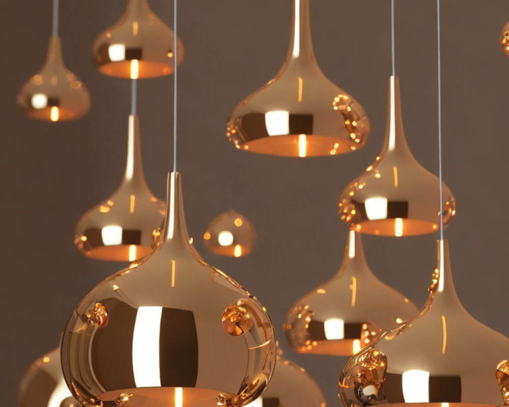 Reflective Gold Pendant Lights on Gray Background for Luxurious Ambiance