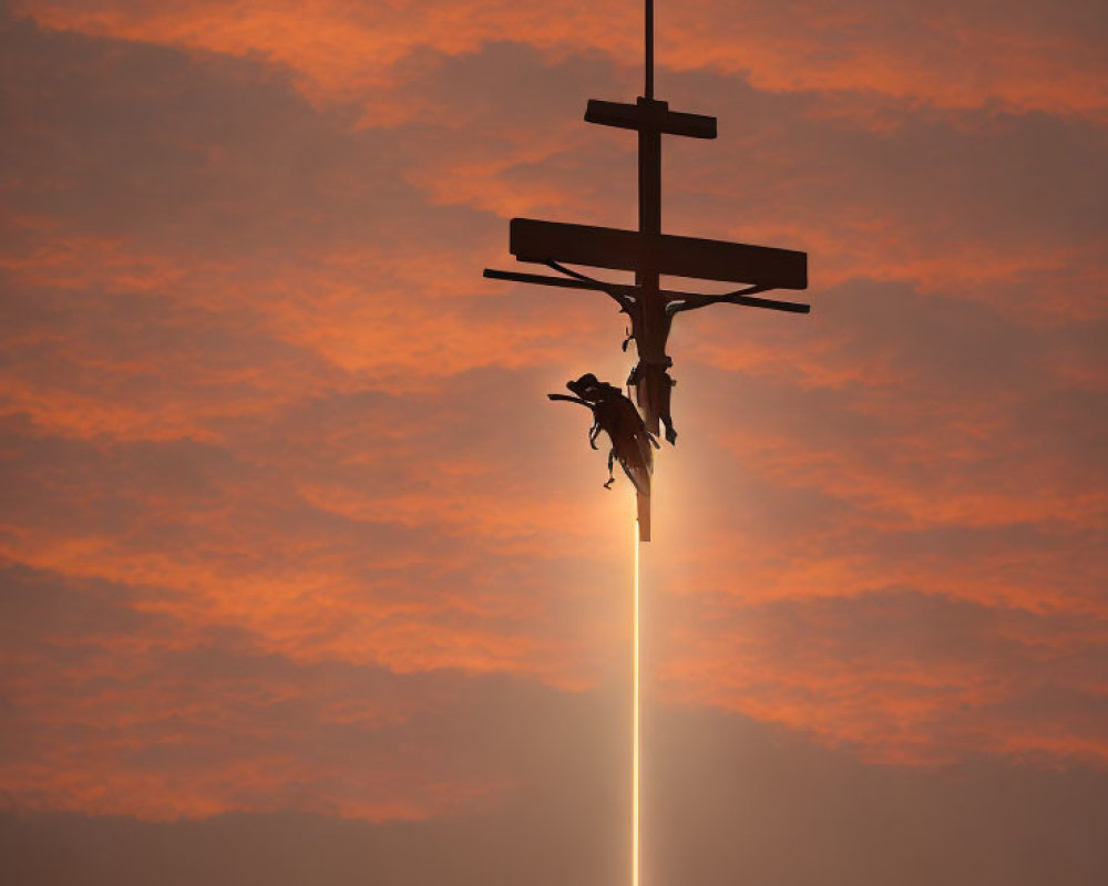 Silhouette of Crucifix with Jesus in Fiery Sky & Beam of Light