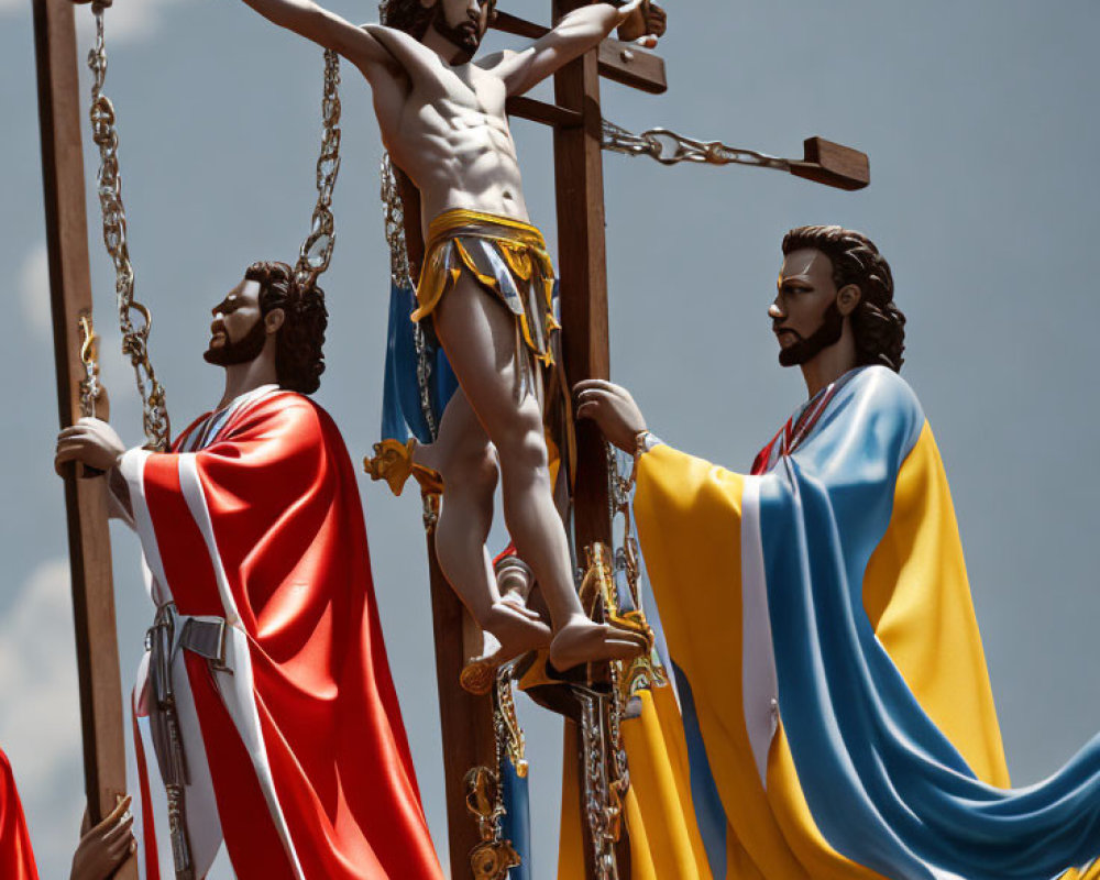 Religious statues of Jesus Christ crucifixion with two others under cloudy sky