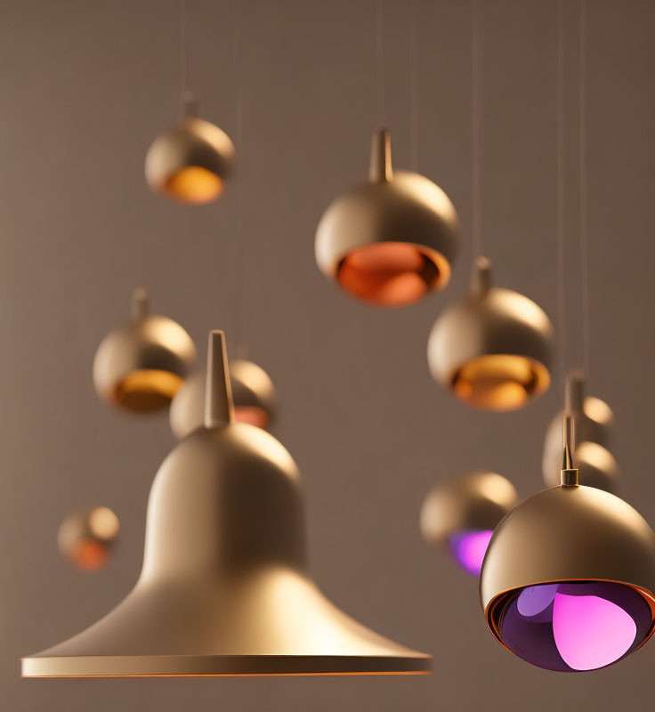 Round metallic pendant lamps with warm glow on muted background