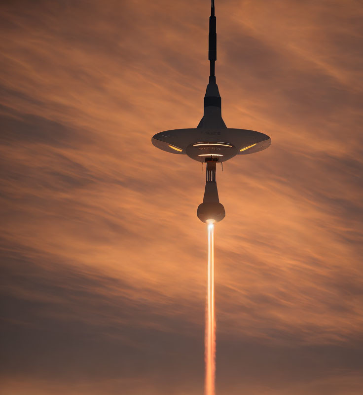 Ceiling light against sunset sky with wispy clouds mimics spacecraft beam