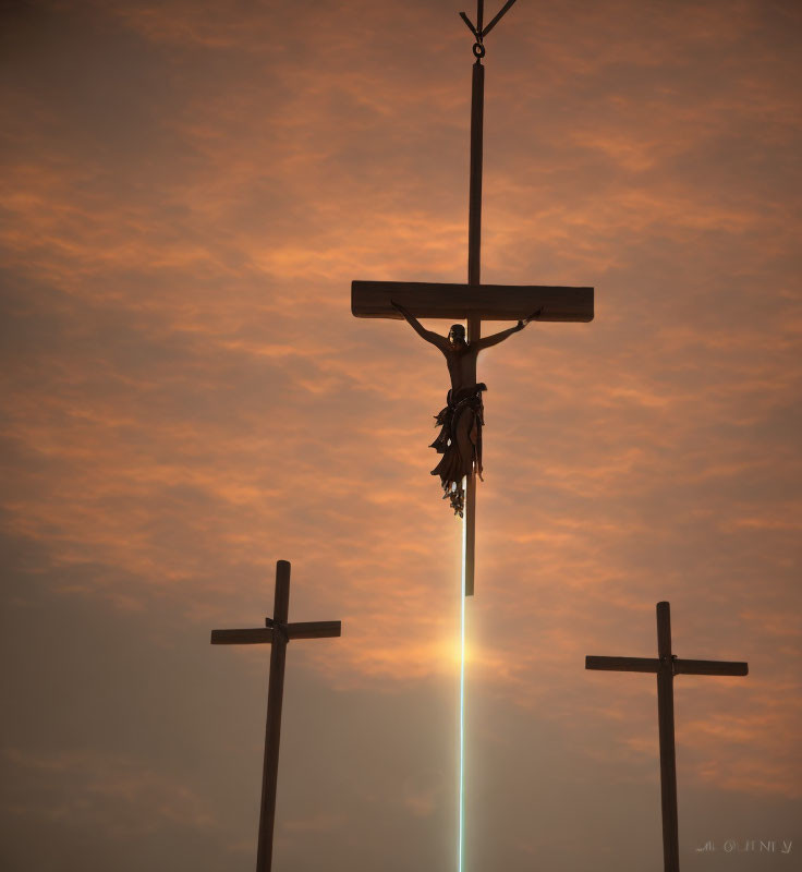 Three Crosses Silhouetted Against Dramatic Sunset Sky