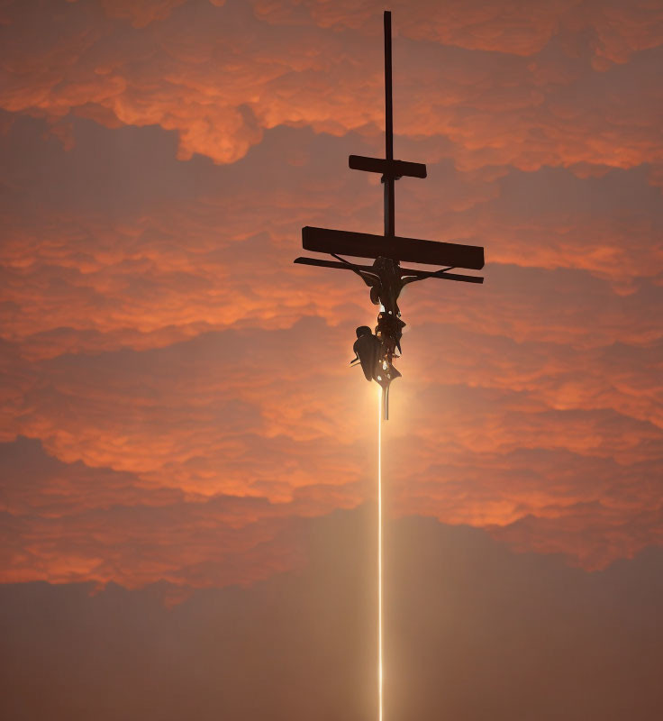 Helicopter silhouette against fiery sunset with bright beam.