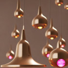 Modern interior featuring rose gold pendant lamps in various shapes on a neutral background