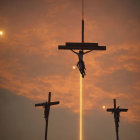 Religious scene: Three crosses at sunset with figures and divine light.