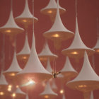 Unique White Fabric Modern Pendant Lights on Warm Orange Ceiling