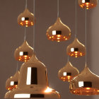 Modern Metallic Pendant Lights in Warm Interior