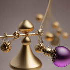 Close-up of balance scale with golden and purple spheres on one side, tipping against neutral background