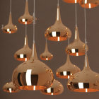 Modern Copper Pendant Lights on Soft Brown Background