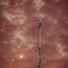 Orange Sunset Sky with Vertical Pole and Symmetrical Birds