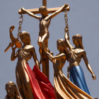 Row of Lady Justice Statues with Scales and Sword Against Blue Sky