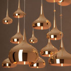 Reflective Modern Copper Pendant Lights Emitting Warm Golden Light