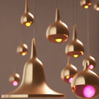 Sleek Gold Pendant Lights with Glowing Pink Bulbs