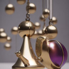 Abstract art installation with golden geometric shapes and purple sphere.